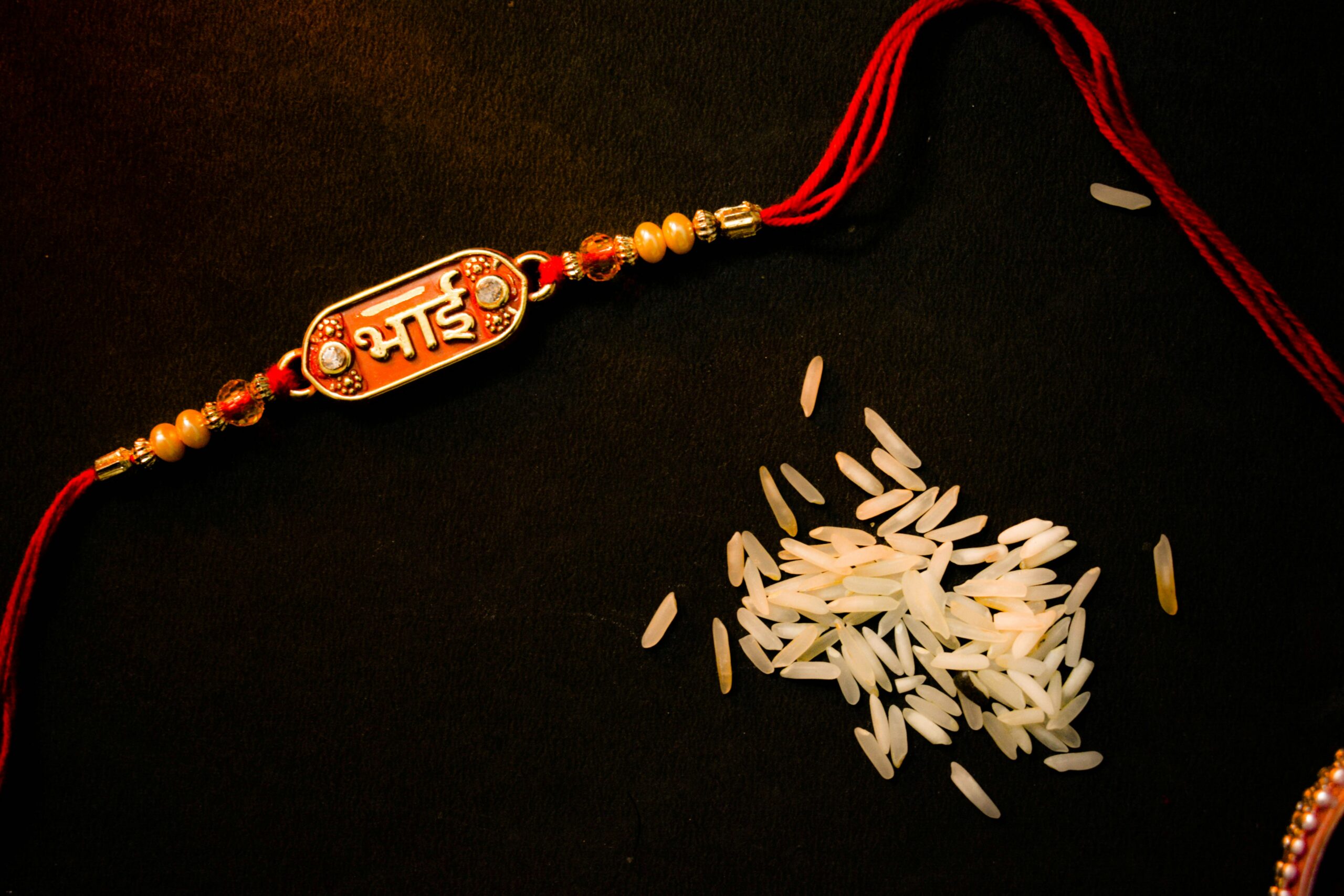 A rakhi with some holy rice